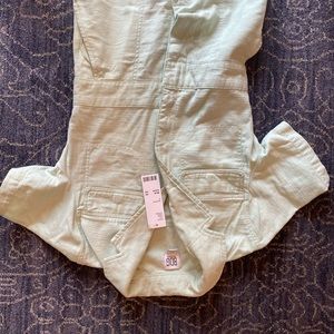 Urban outfitters mint jumpsuit with tags never been worn side small!